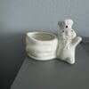 A white ceramic dish with a person on it.