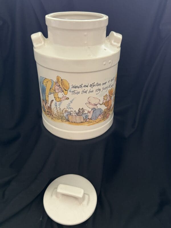 A white container with a picture of winnie the pooh on it.