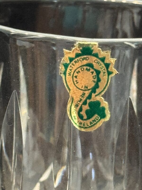 A close up of the glass with a sticker on it