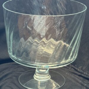 A glass bowl with a pattern on it