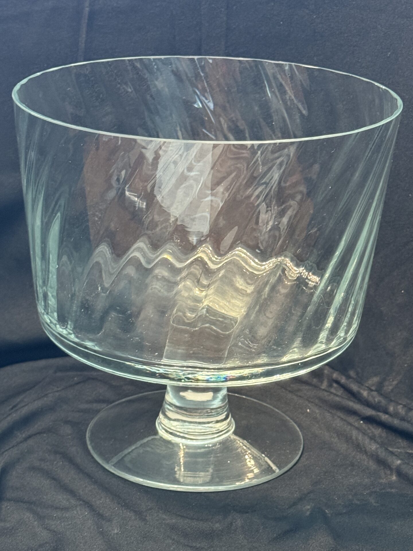 A glass bowl with a pattern on it