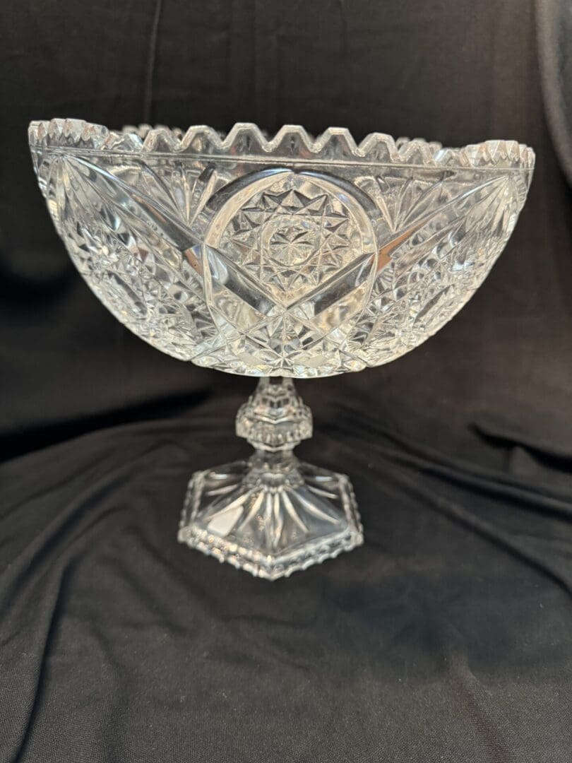 A glass bowl sitting on top of a table.