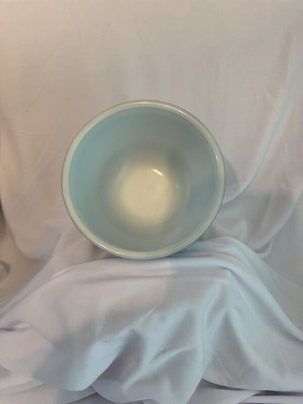 A bowl sitting on top of a table.