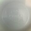 A white plate with the word pyrex written on it.