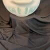 A white bowl with blue designs on it