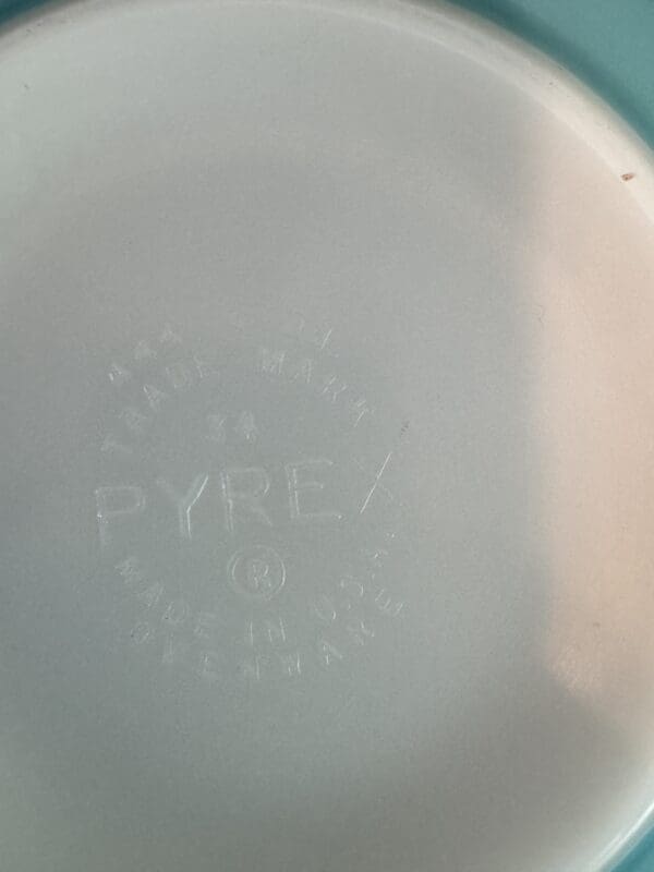 A close up of the logo on a plate