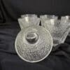 A set of six glasses and a bowl.