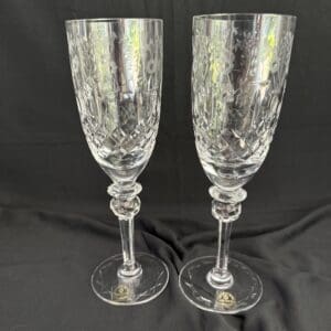 A pair of wine glasses with a floral design.