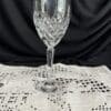 A wine glass sitting on top of a table.