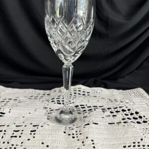 A wine glass sitting on top of a table.