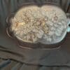A large glass dish with flowers on it