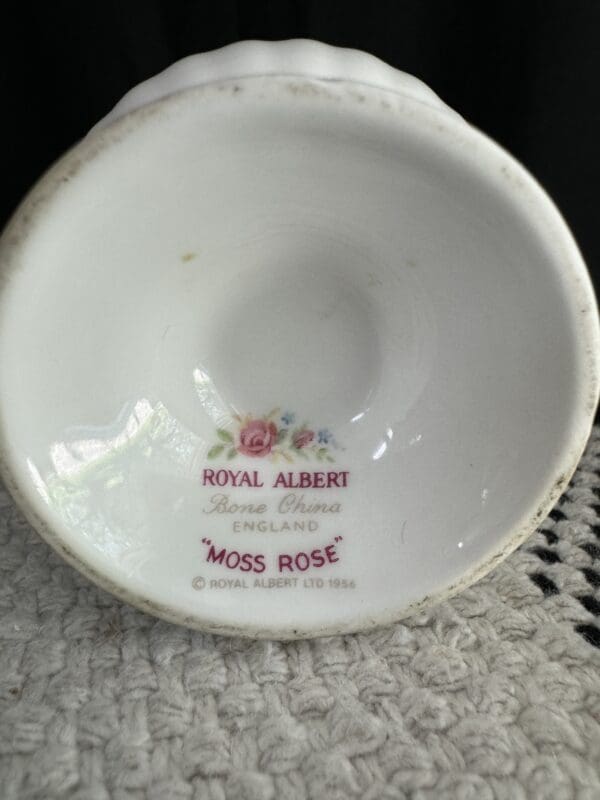 A white bowl with the name of miss rose on it.